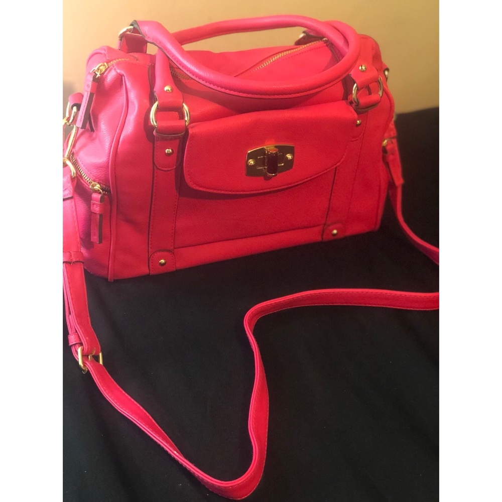 Pink bag with shoulder strap & gold accents